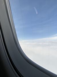 View of sky seen through airplane window