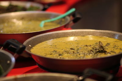 Cropped hand of person preparing food