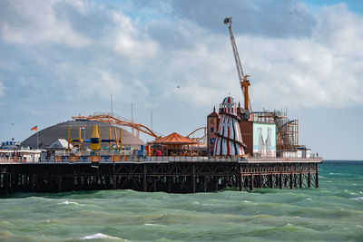 Brighton palace pier, with the seafront behind.