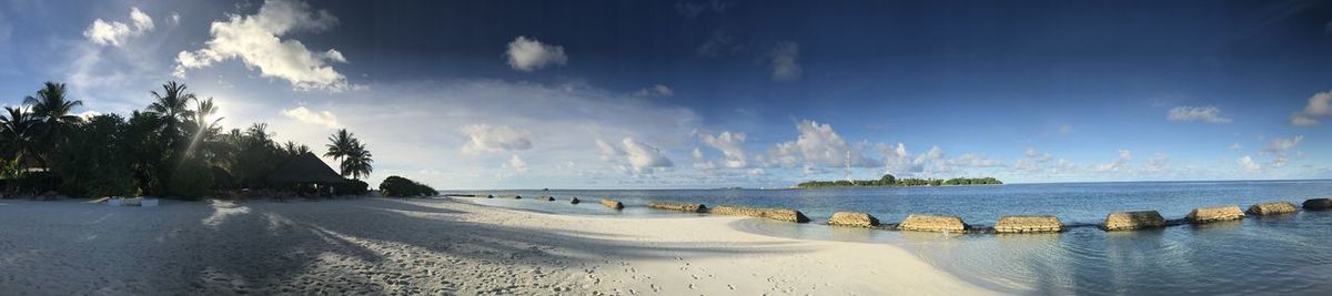 Panoramic view of beach against sky