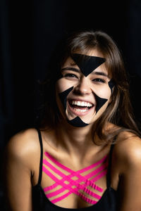 Face taping, beautiful girls face with cosmetological tape. face aesthetic taping. anti-aging
