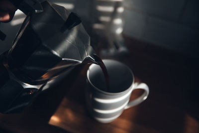 Close-up of coffee cup on table