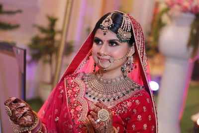 Portrait of young woman in traditional clothing