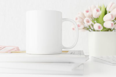 Close-up of coffee cup on table