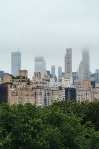 Skyline of new york from central park a foggy day in manhattan