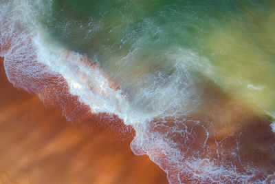 High angle view of surf at beach