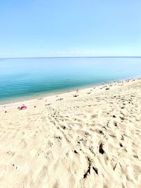 Scenic view of beach against clear sky