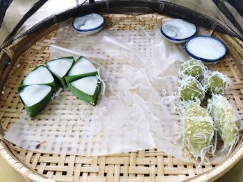 High angle view of thai desserts in basket