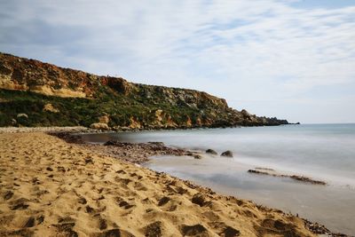Scenic view of beach against sky