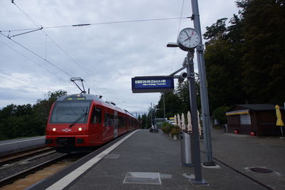 Train on railroad tracks against sky