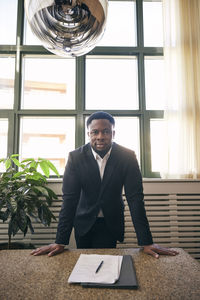 Portrait of businessman working at home