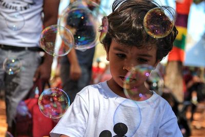 High angle view of girl with bubbles