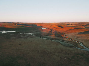 High angle view of land against clear sky