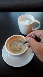 Coffee cup on table