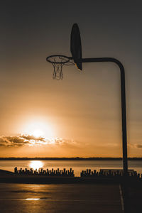 Scenic view of calm sea at sunset