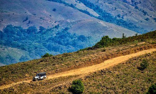 Car on road by land