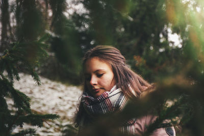 Portrait of woman in forest