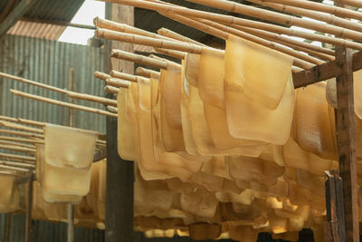 Close-up of clothes hanging on rack