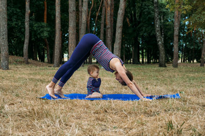 Mommy and me yoga for babies and postpartum moms. zen family yoga. postpartum mother and baby girl
