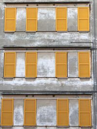 Full frame shot of yellow windows