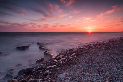 Scenic view of sea against sky during sunset