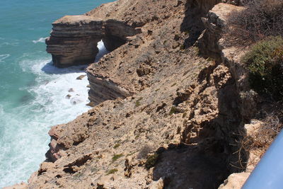 High angle view of rock formation on beach