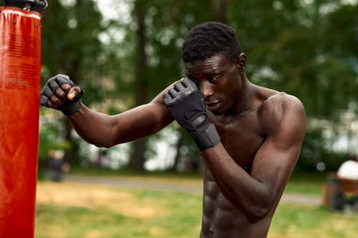 Man exercising in park