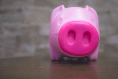 Close-up of pink toy on table