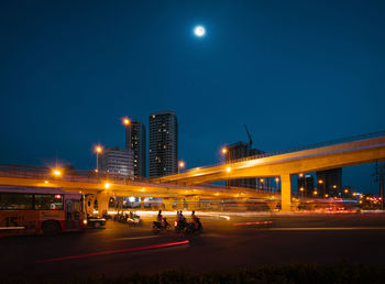 Light trails on city street at night