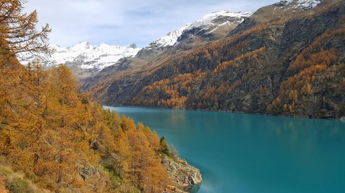 Scenic view of lake against sky during autumn