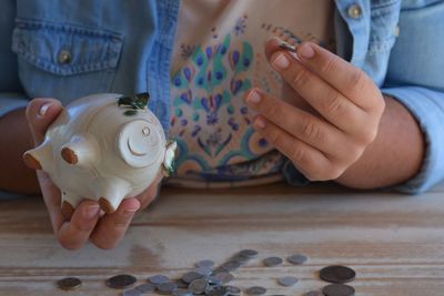 Midsection of woman holding ice cream