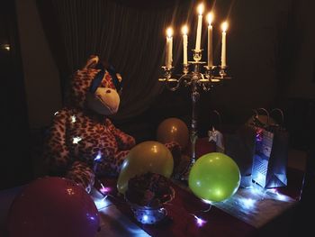 Close-up of illuminated christmas lights on table
