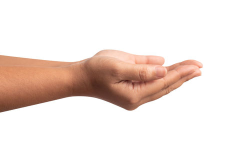 Close-up of hand against white background