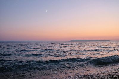 Scenic view of sea at sunset