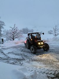 View of car on snow covered land