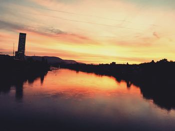 Scenic view of river during sunset