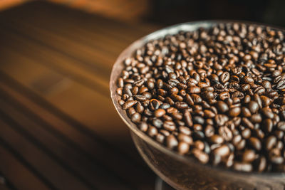 Close-up of coffee beans on table