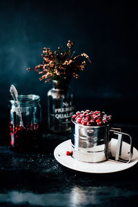 Cranberries on powdered sugar shaker