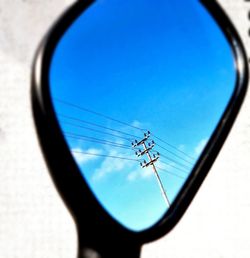 Close-up low angle view of blue sky