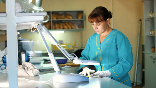 Young woman working in laboratory