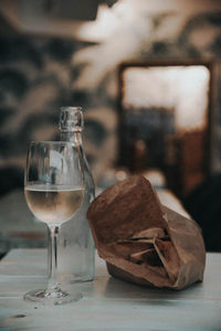 Close-up of wineglass on table