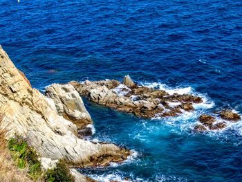 High angle view of rocks on beach