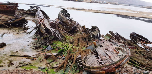 High angle view of abandoned building by river