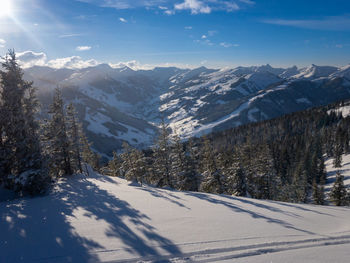 Scenic view of snowcapped mountains against sky