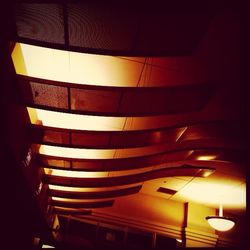 Low angle view of illuminated lamp