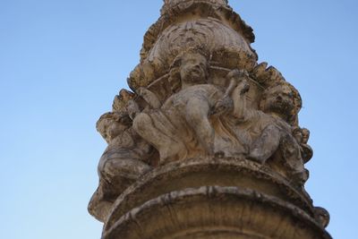 Low angle view of statue against clear sky