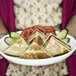 Close-up of hand holding coffee cup