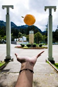 Midsection of person against sky