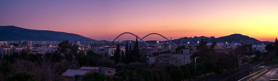 Athens, greece - february 17, 2020. sunset over the athens city and olympic stadium complex