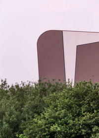 View of building by trees